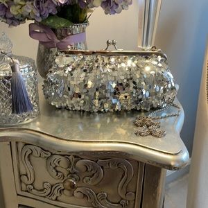 Silver sequin clutch handbag